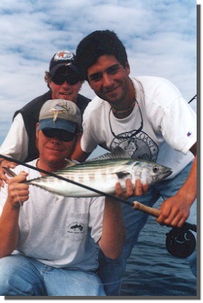 Bonito Master Rob Morrison and friends prepare to release another flyrod bonito. Photo: 
Tom Rapone